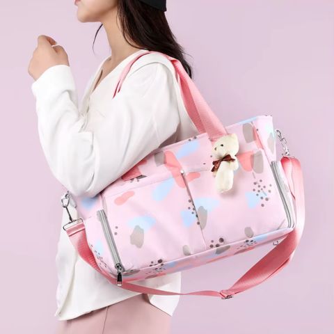sac-Ă -langer-jumeaux-rose-avec-motif